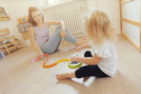 Bright Light Colored Room Mother Daughter Play Colorful Wooden Constructions — Stockfoto