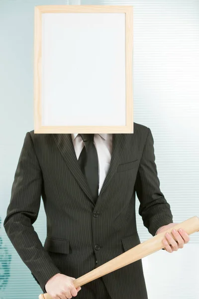 Hombre Con Cabeza Cartel Enmarcado Una Oficina Pie Sosteniendo Bate —  Fotos de Stock