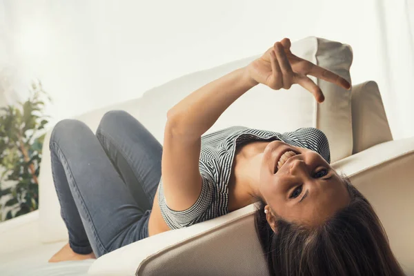 Young Woman Lying Her Back White Sofa Head Upside Armrest — Stock Photo, Image