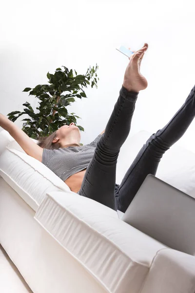 Young Woman Girl Takes Selfie While Lying Her Back Her — Stock Photo, Image
