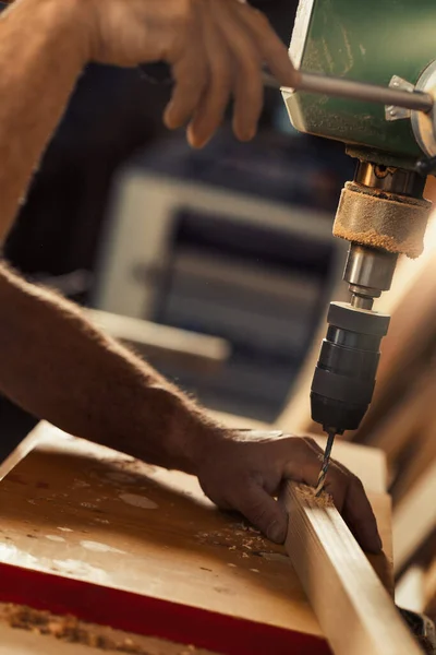 Carpenter Uses Drill Press His Workshop His Left Hand Taking — Stock Photo, Image