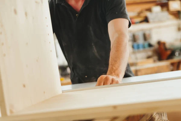 Carpenter Hand Pushing Supporting Piece Furniture Construction Blurred Background His — Stock Photo, Image