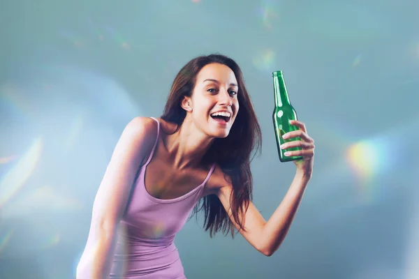 Girl Green Bottle Celebrates Appears Slightly Tipsy Young Woman Pink — Stock Photo, Image
