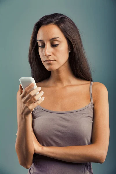 Young Woman Looks Her Cell Phone Screen Serious Upset Get — Stock Photo, Image