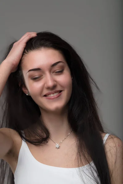 Smiling Woman White Tank Top Long Dark Hair Carefree Youth — Stock Photo, Image