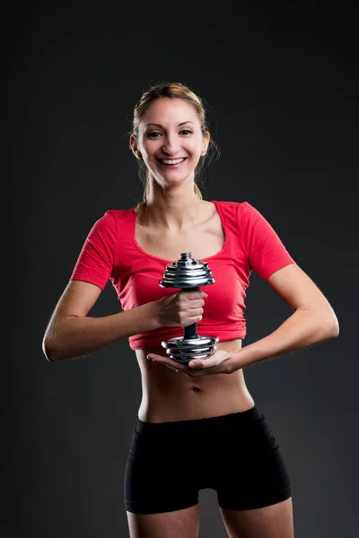 Conceptos Fitness Gimnasio Estiramiento Pesas Mujer Joven Sostiene Verticalmente Peso —  Fotos de Stock