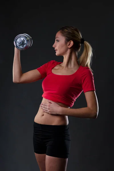 Fitness Lidenskabelig Blondine Løft Vægt Understreger Hendes Pasform Mave Rød - Stock-foto