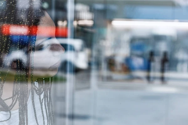 Boxbraids Woman Window Reflecting Outdoors Barely Visible She Seems Thoughtful — Stock Photo, Image