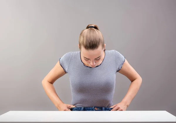Girl Checks Her Jeans Waist Table Wondering She Too Fat — Stock Photo, Image