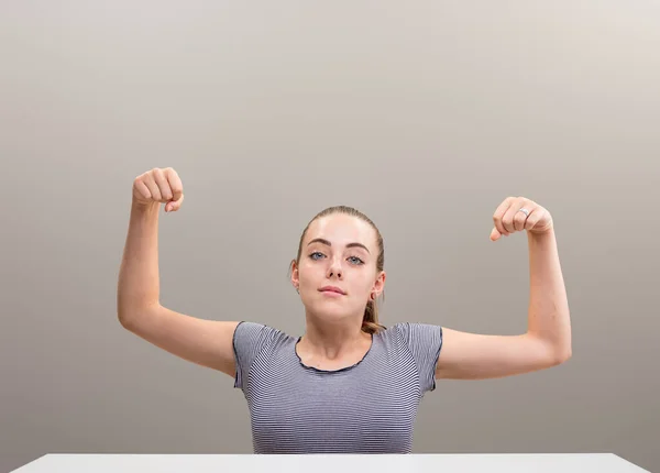 Girl Desk Proudly Shows Her Muscles Fists Clenched Head Raised — Stock Photo, Image