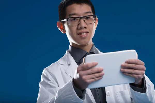 Scientist Chinese Ethnicity Reviews Data His Tablet Intrigued Screen Content — Stock Photo, Image