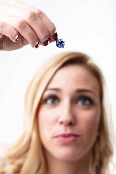 Blurry Blonde Woman Holding Tiny Gift Focus Expressing Disappointment Present — Stock Photo, Image