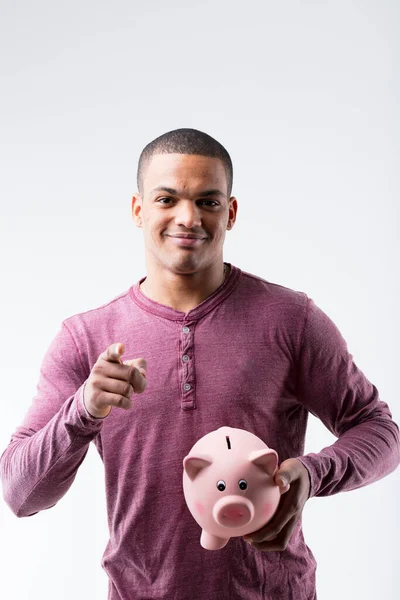 Black Man Pointing Holding Piggy Bank Urges Investing Purchasing Advocating — Stock Photo, Image