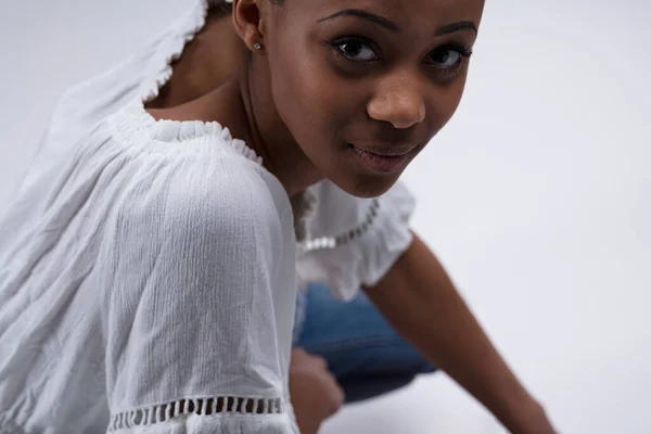 Portrait Young Woman Sitting Turning Listen Wearing White Blouse Jeans — Stock Photo, Image