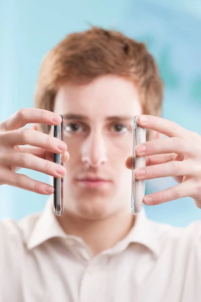 Two Smartphones Held Hands Focus Face Each Other Leaving Space — Stock Photo, Image