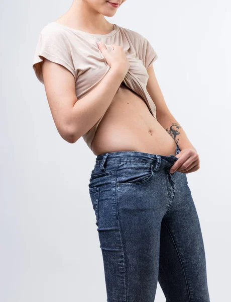 Young Woman Checks Her Perfect Flat Stomach Unrecognizable Woman Skinny — Stock Photo, Image