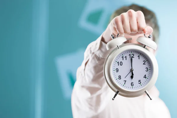 Blurry Office Backdrop Hand Extends Sizable Clock Corporate World Time — Stock Photo, Image