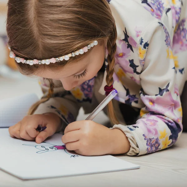 Girl Immersed Drawing Creating Imaginary Beings Lying Her Stomach Engaged — Stock Photo, Image
