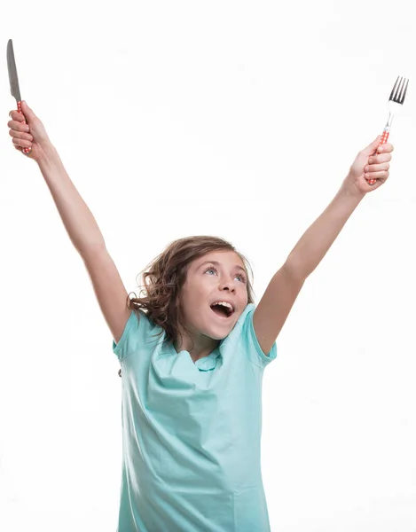 Ittle Girl Blue Shirt Arms Raised Holding Cutlery Celebrates Mealtime — Stock Photo, Image