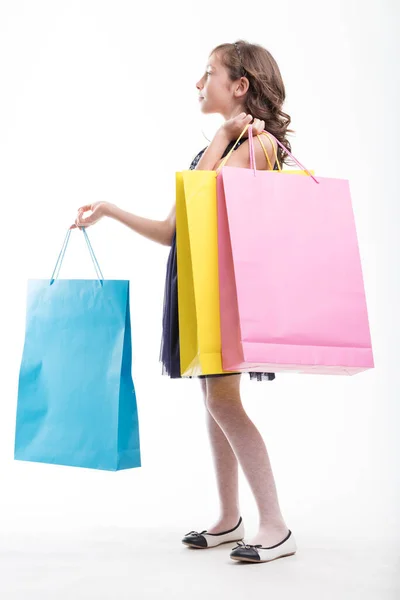 Snygg Tjej Med Shoppingväskor Sidoporträtt Vitt Håller Blå Väska Och — Stockfoto