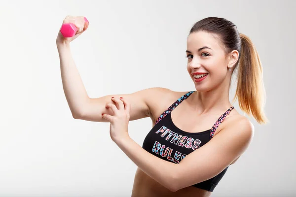 Playful Young Lady Shows Her Muscles Amused Her Fitness Achievement — Stock Photo, Image