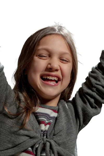 Dziewczyna Emanuje Radością Pasiastej Bluzce Szarym Kardiganie Dżinsach Futrzanych Butach — Zdjęcie stockowe