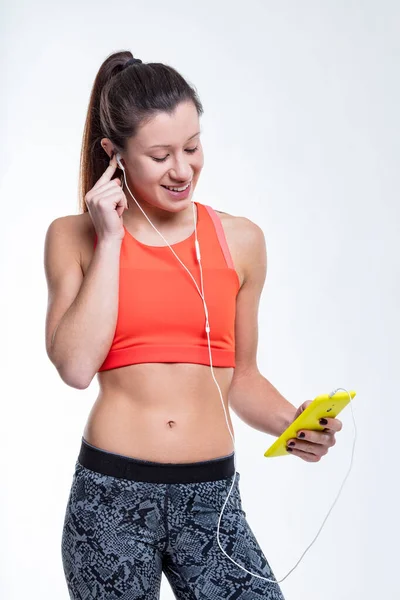Gym East Asian Woman Sports Clothes Engages Her Phone Her — Stock Photo, Image