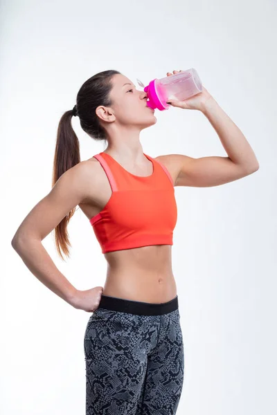 Gym Woman Hydrates Her Muscular Arm Display Underscoring Importance Drinking — Stock Photo, Image