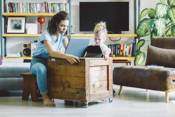 Mother Daughter Living Room Each Mobile Devices Little Girl Plays — Stock Photo, Image