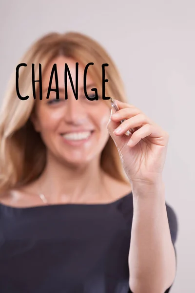 Blurred Background Smiling Woman Writes Change Either Thin Air Transparent — Stock Photo, Image