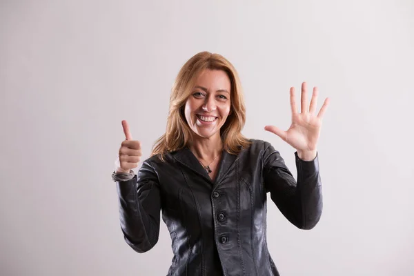 Smiling Adult Woman Uses Hand Gestures Signify Fraction One Fifth — Stock Photo, Image