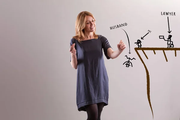 Playfully Woman Draws Air Humorously Depicting Herself Pushing Her Husband — Stock Photo, Image