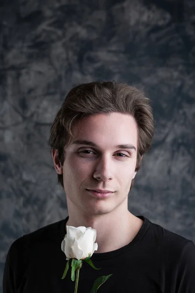 White Rose Extended Man Languid Eyes Tell Stories Amidst Grunge — Stock Photo, Image