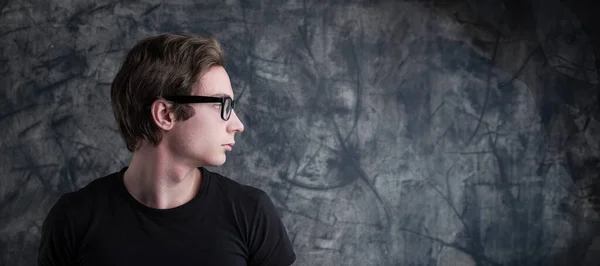 Pondering Deeply Young Man Light Brown Hair Contrasts Grunge Backdrop — Stock Photo, Image