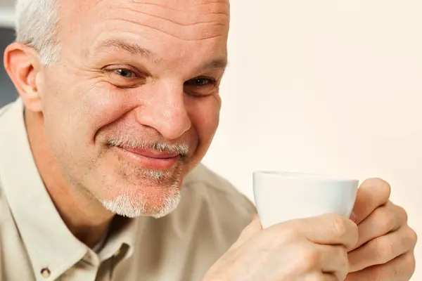 Amidst His Thoughts Aged Man Tries Laugh Holding Drink Likely — Stock Photo, Image