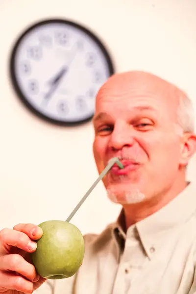 Apple Focus Elderly Man Believes Proverb Apple Day Keeps Doctor — Stock Photo, Image