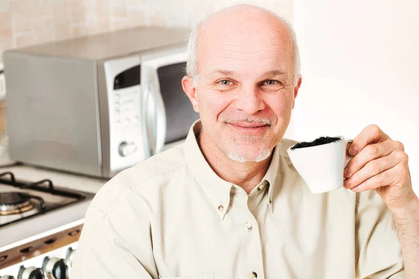 Elderly Gentleman Smiling Showcases Coffee Cup Which Insects Crawl Scene — Stock Photo, Image