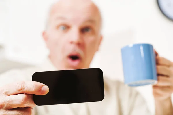 Kitchen Old Man Experiences Shock Viewing Content His Smartphone Materials — Stock Photo, Image