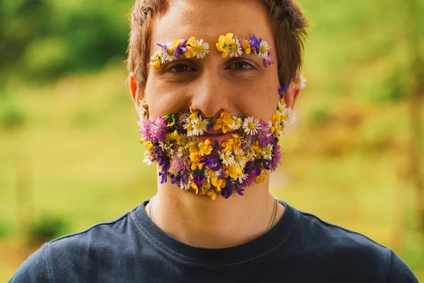 Amidst Greenery Unique Sight Unfolds Man Whose Face Tapestry Flowers — Stock Photo, Image