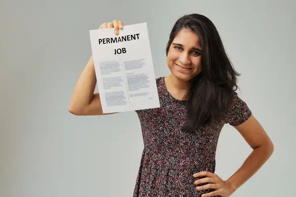 Beaming Smile Confident Posture Woman Holds Paper Proclaiming Permanent Job — Stock Photo, Image