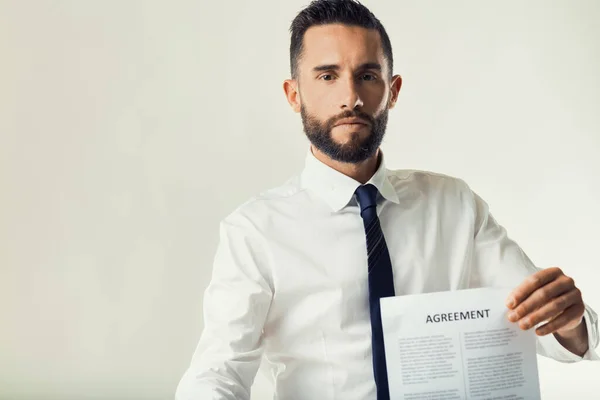 Man Business Attire Displays Document Indicating Moment Negotiation — Stock Photo, Image