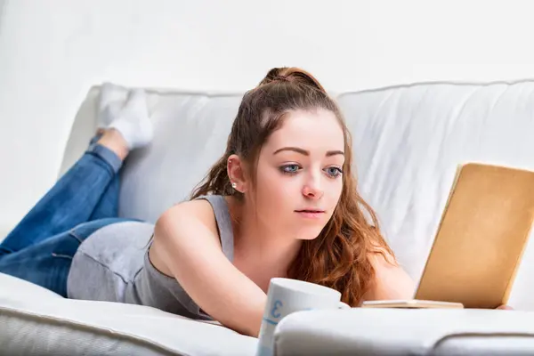 Propped Her Elbow She Delves Book Comfort Couch Fostering Ideal — Stock Photo, Image