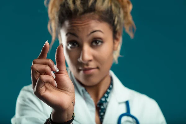 Healthcare Professional Gestures Small Amount Her Fingers Perhaps Indicating Precise — Stock Photo, Image