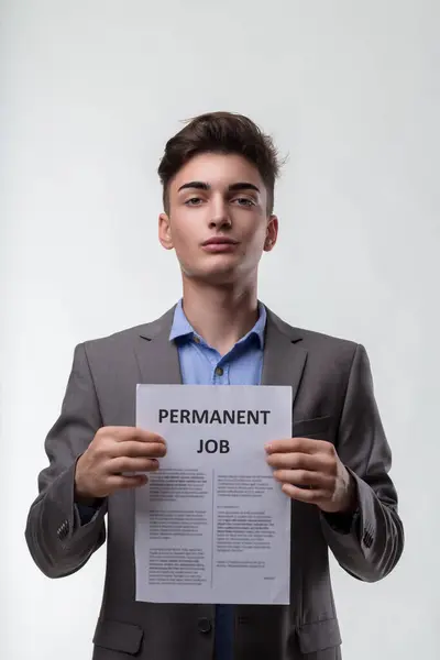 Poised Assurance Man Showcases His Permanent Job Document Signaling Stable — Stock Photo, Image