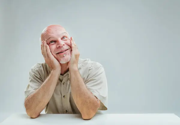 Elderly Man Daydreams Tender Smile Hands Cupping Cheeks Gesture Contentment — Stock Photo, Image