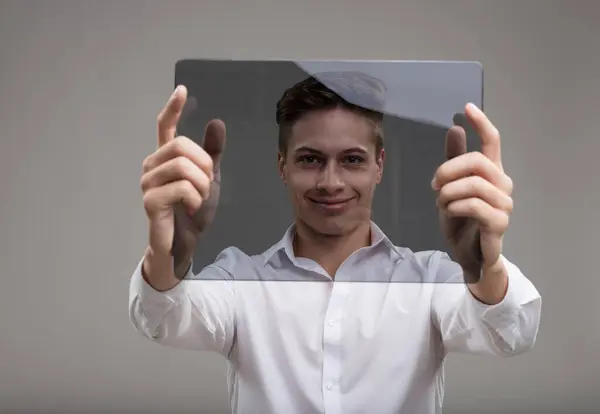 Man White Holds Transparent Futuristic Tablet His Face Framed Innovation — Stock Photo, Image