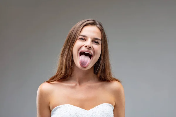 Full Spunk She Makes Playful Gesture Reminiscent Youthful Mischief Lighthearted — Stock Photo, Image