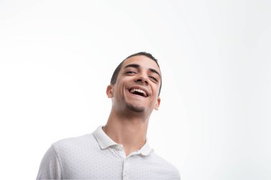 Man's spontaneous chuckle embodies a lighthearted, carefree moment in time clipart