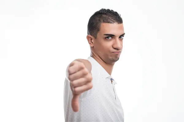 Young Man Gives Thumbs His Expression Mixing Disapproval Hint Playfulness — Stock Photo, Image