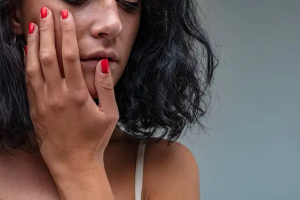 Woman Rests Hand Her Face She Does Know Whether She — Stock Photo, Image